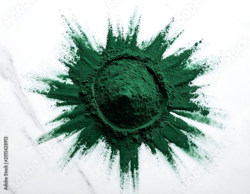 Detailed spirulina powder explosion with fine particles on marble, elegant green burst for organic wellness design.
