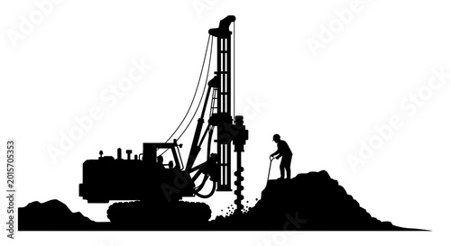 Industrial drill rig silhouette at construction site ground