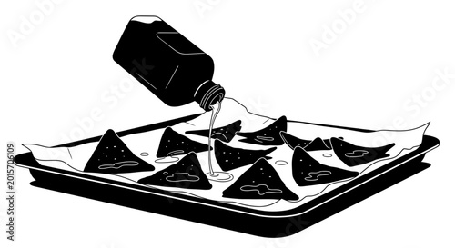 Pouring oil onto tortilla chips on a baking tray