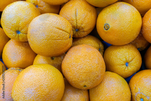 Abundant Pile of Fresh Ripe Oranges Background