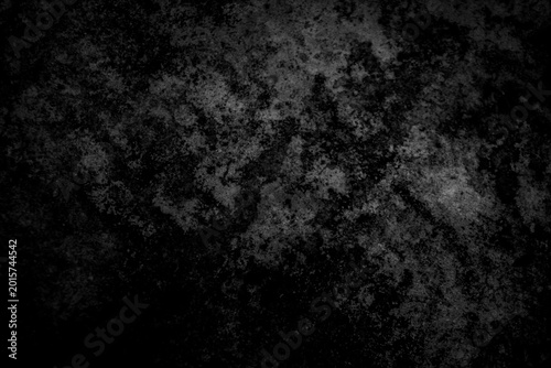 Gritty dark concrete wall texture with heavy grain. Abstract black moody stone background, perfect for industrial overlays, dramatic posters, and cinematic grunge design concepts.