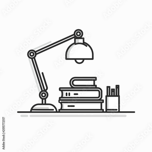 Desk lamp on a stack of books.