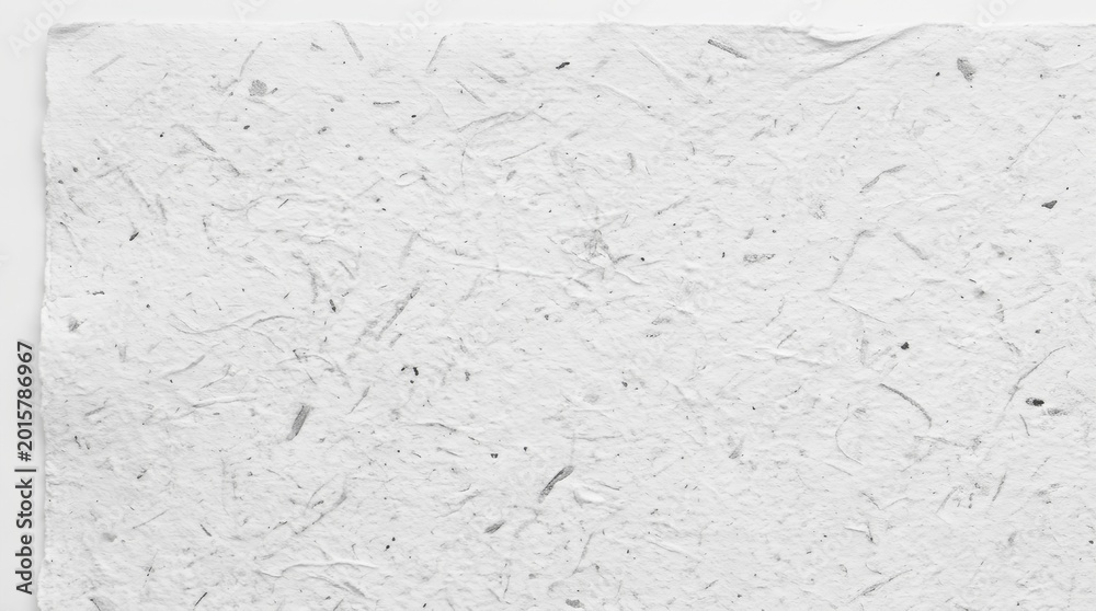 Fototapeta premium Natural white handmade paper texture with rough fibers and organic speckled surface pattern
