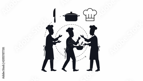 Silhouette of chefs in kitchen.