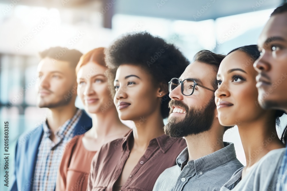Obraz premium Diverse professionals looking forward with confidence