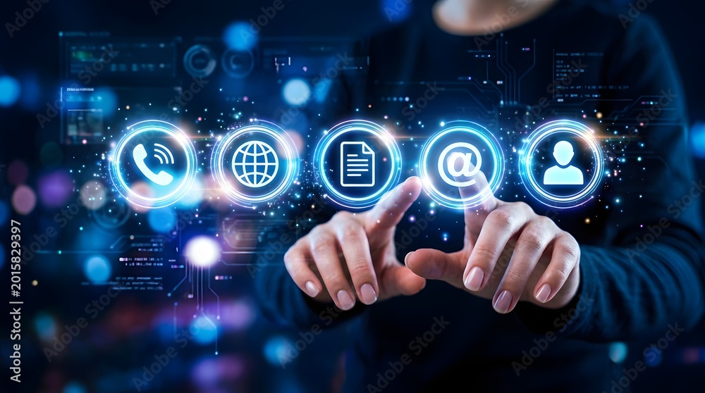 Fototapeta premium Business technology and communication icons floating above woman's fingers