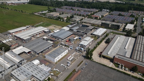 industrial logistics hub: An aerial view showcases a sprawling industrial park, where diverse manufacturing plants and warehouses operate, symbolizing economic activity and infrastructural strength.