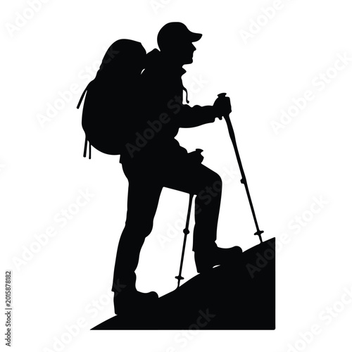 Hiker climbing a hill, silhouette of a man with backpack and trekking poles