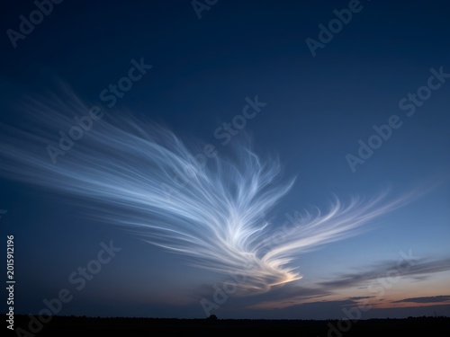 Ethereal Noctilucent Clouds Glowing at Twilight. Cloud Formations.
