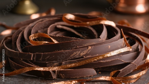 High Angle Close Up of Dark Chocolate Shavings and Ribbons