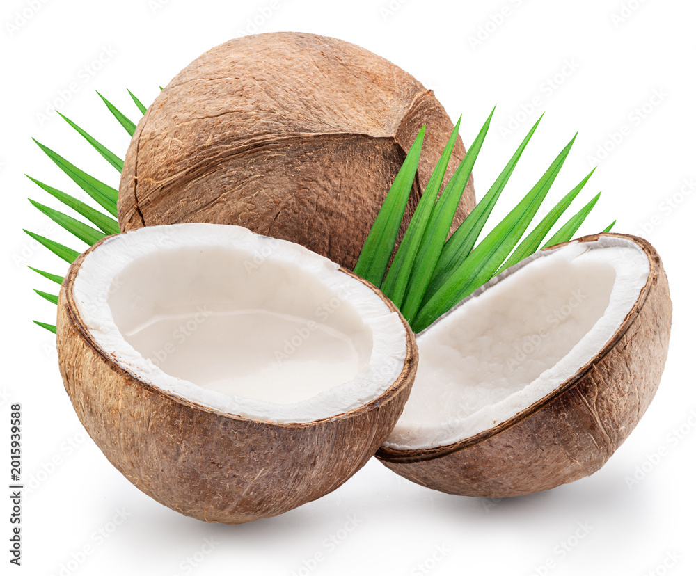 Fototapeta premium Peeled coconuts fruit with white flesh, palm leaves and a piece of coconut