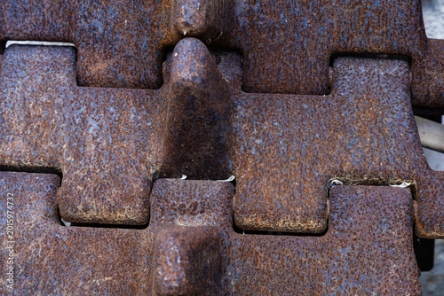 Schilderij op canvas Background. Close-up. A section of an old steel crawler track
