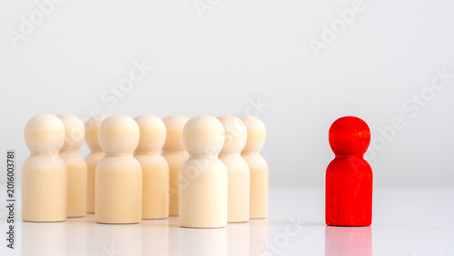 Photos Wooden figures stand in a row