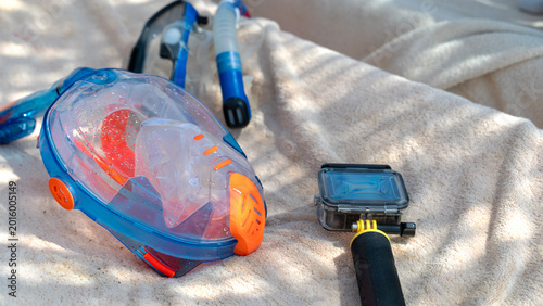 Konstfotografi Bright snorkel mask rests on soft towel