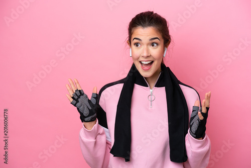 Photos Young sport Brazilian woman isolated on pink background with surprise facial exp