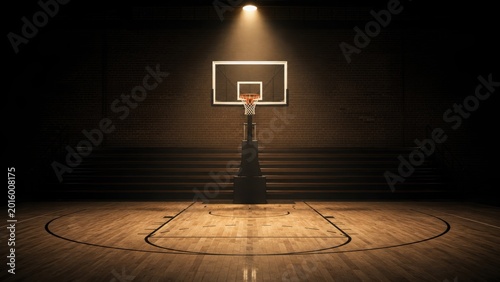 Empty basketball court illuminated by spotlight dramatic sports arena interior