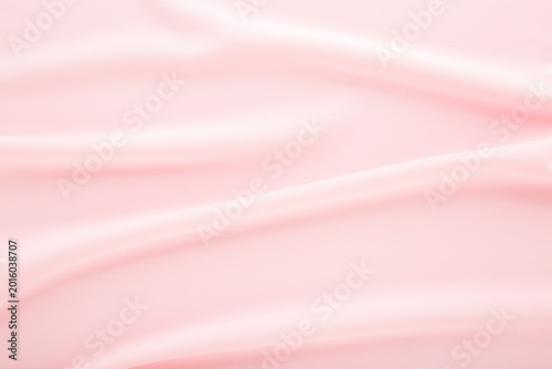 Fotografia Pastel light pink soft wrinkled gabardine elastane fabric background