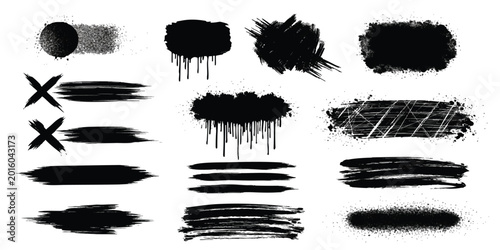 Foto Set of black ink brush strokes and messy paint splatters for artistic design pro