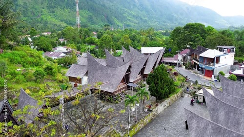 Aerial view of traditional Batak houses village near Lake Toba in Samosir Indonesia