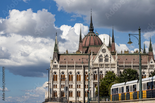 Budapest, Hungary, Parliament building on a summer day, yellow tram