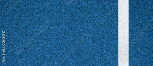 Fotografía Blue sport field texture with white line close up background