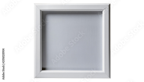 Slika na platnu Empty white wooden shadow box frame with textured silver interior, isolated on t