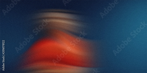 Blurred human figure in orange shirt moving fast against a blue background motion blur effect grainy texture.
