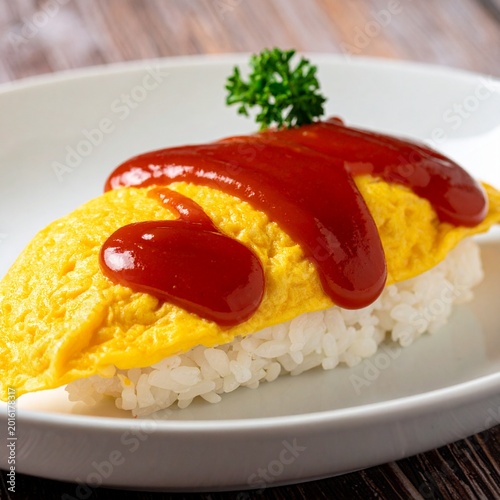 Omelet over rice, ketchup