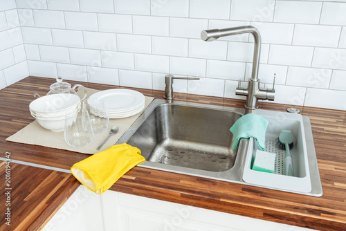 Bild auf Leinwand Minimalist kitchen. Countertop, sink. Clean, bright, comfortable
