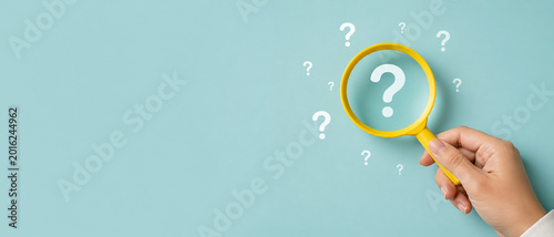 Magnifying Glass With Question Marks Problem Solving Concept