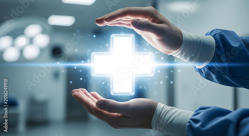 Medical professional holding bright glowing hospital cross sign symbol in sterile room.