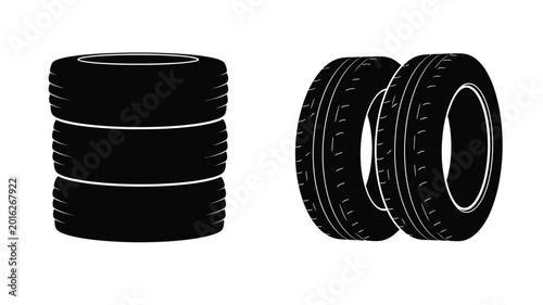 Stack of tires and two tires black silhouette on white background