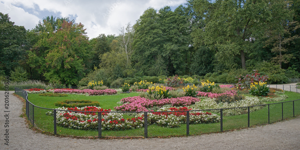 Fototapeta premium flower bed and trees of Tiergarten park, Berlin, Germany 