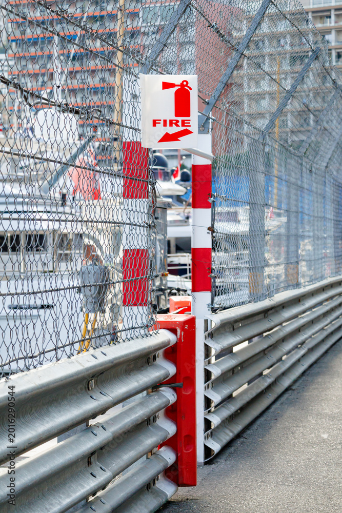 Fototapeta premium Fire safety stations positioned along the harbor in Monaco