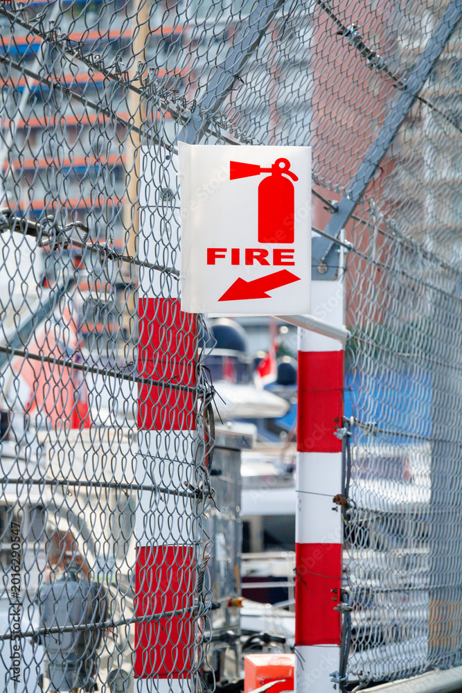 Fototapeta premium Fire safety stations positioned along the harbor in Monaco