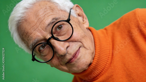 Elderly man with glasses and orange sweater perfect for UI/UX design and motion graphics