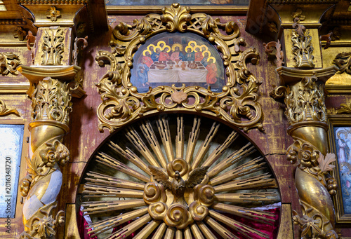 Medieval carved ornaments and a painting with Christ and the Apostles above the altar in the Church of Dimitri Tsarevich on Blood