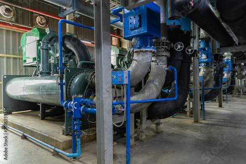 Large industrial water chiller system with pipes