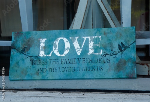 Vászonkép Word love on antique teal-colored sign