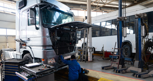 Konstfotografi Truck repair service indoors. Maintenance workshop.