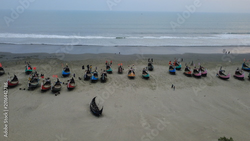 Traditional Wooden Fishermen's fishing boat, Teknaf Coxs bazar, Bangladesh. Colorful Wooden Fishing Boat On a Cox's Bazar Sea Beach With Sunny Day Background in Bangladesh. Beautiful Bangladesh Photo.