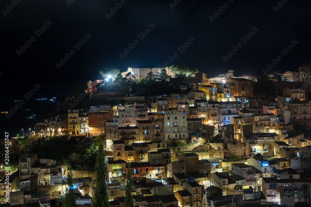 Fototapeta premium Piazza Armerina cityscape at night with the Aragonese Castle, Sicily