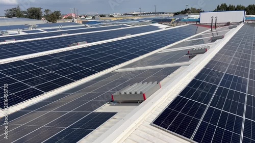 Factory roof covered with solar panels.