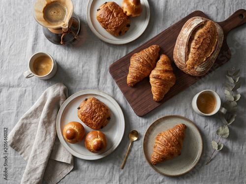 Luxury pastry flat lay with croissants and coffee
