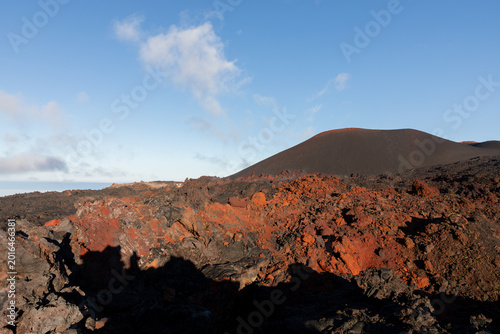 Bilde på lerret Wide view of Tolbachinsky Dol lava field with rugged basalt rocks and a dark cin