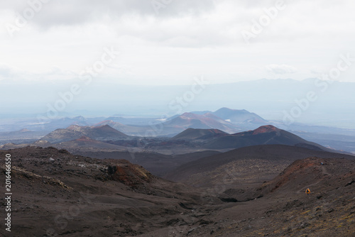 Schilderij op canvas Wide view of Tolbachinsky Dol volcanic plateau with lava fields, cinder cones an