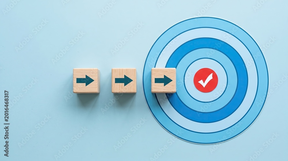 Obraz premium Wooden arrow blocks pointing toward target with checkmark on blue background