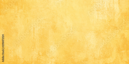 Yellow grunge texture background with distressed weathered effect and vintage paper parchment style for design projects