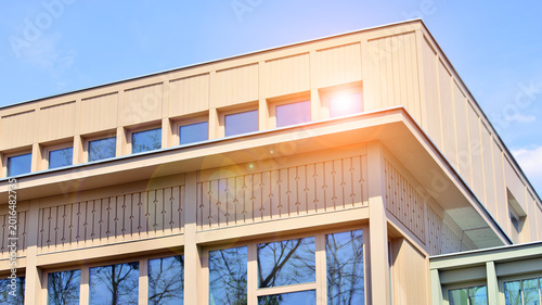 A fragment of a low-rise office building in the classical style. Modernity and tradition in office architecture.