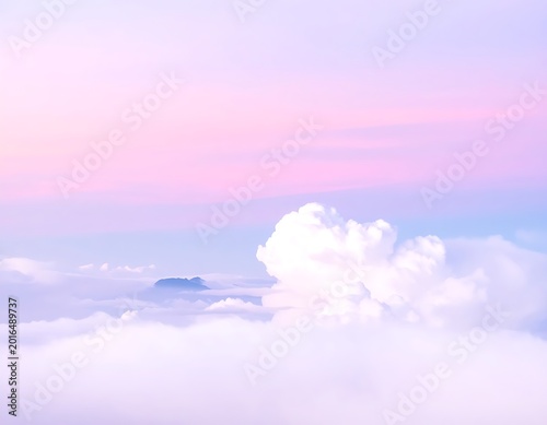 A serene sky with pink and purple hues and fluffy white clouds